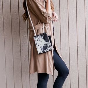 Urban Outfitters Furry Cow-Print Crossbody Purse